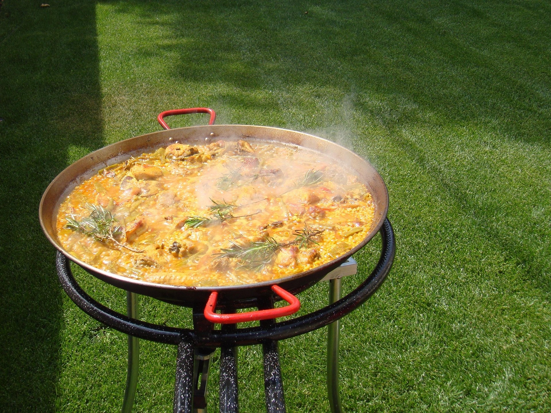 A pan of paella at a Valencian table