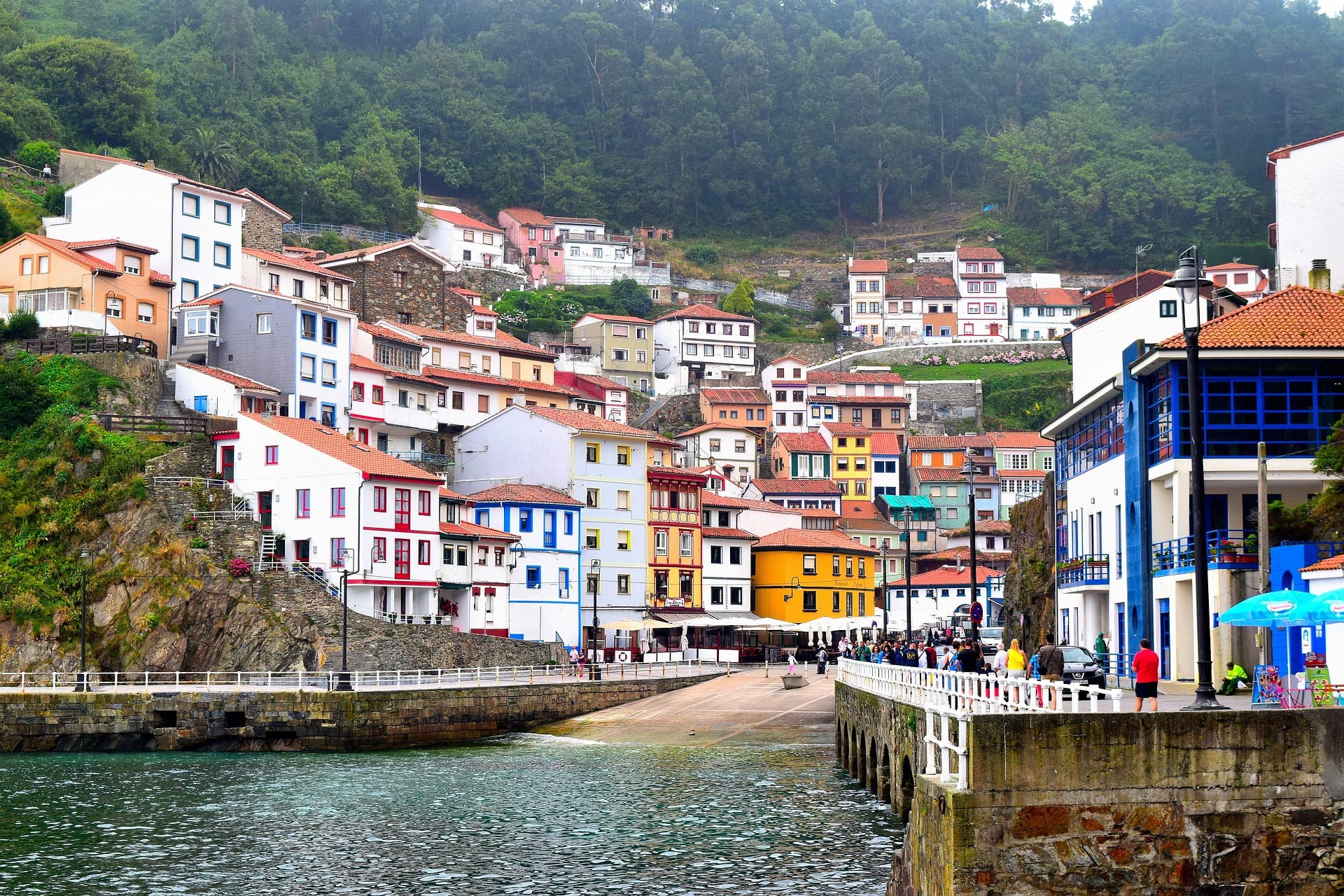 The harbor houses of Cudillero stacked above the water